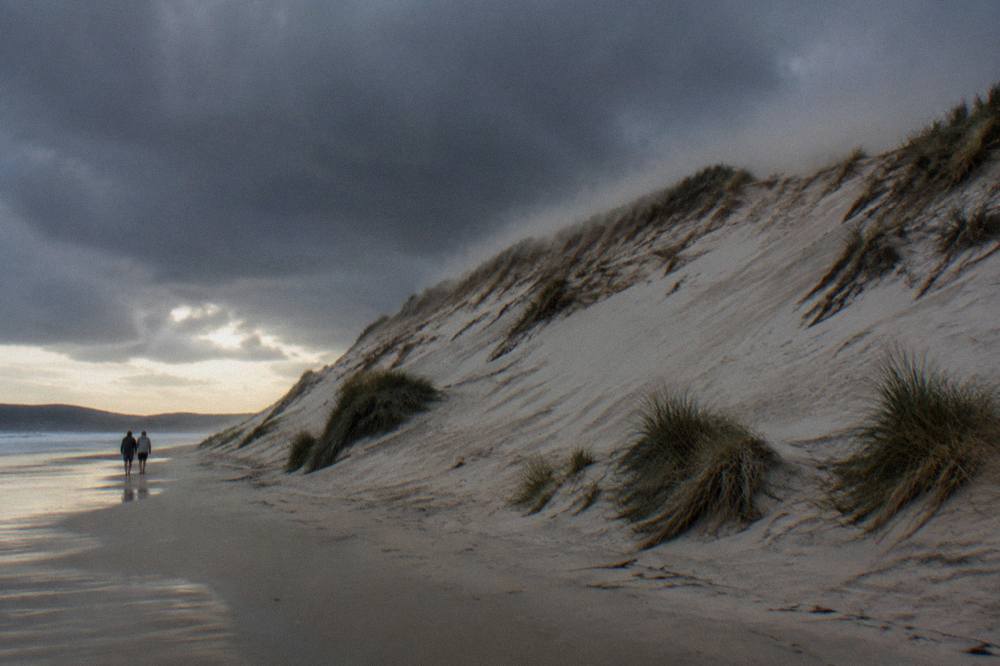 Steep sand slope of the Stockton Bight dunes rising above the beach